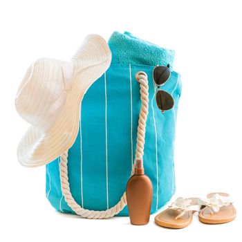 bag with beach accessories isolated on a white background