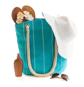 bag with beach accessories isolated on a white background