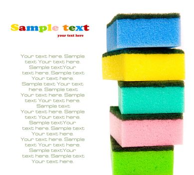 Brightly colorfull sponges on white background