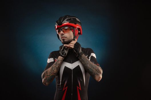 guy is a cyclist in a Bicycle helmet