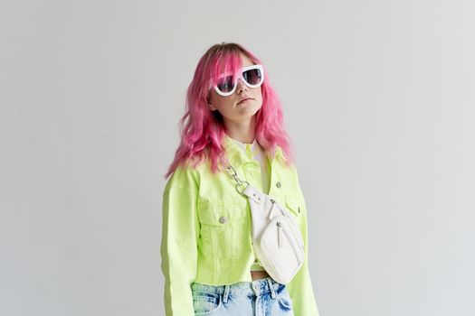woman with pink hair teen fashionable clothes posing neon. High quality photo