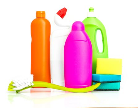 cleaning supplies and sponges on white background