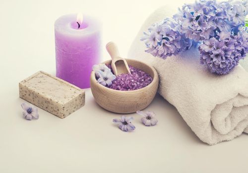 Composition of spa treatment on the white wooden table