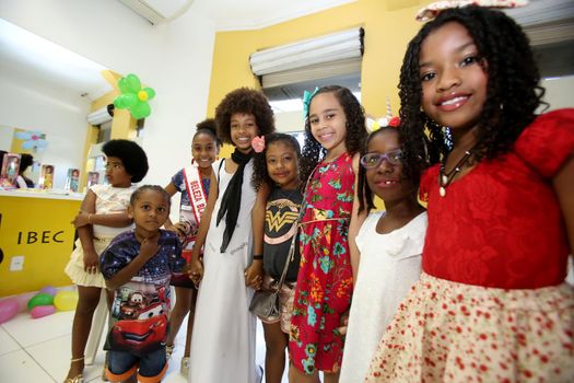 salvador, bahia, brazil - october 13, 2017: Children of black ethnicity are seen in a beauty salon in the city of Salvador.