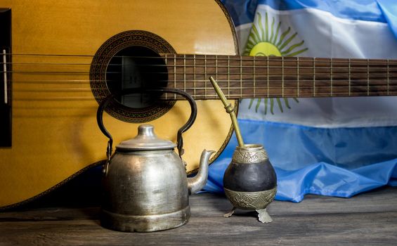 yerba mate, guitar and fried pastries, symbols of the Argentine tradition