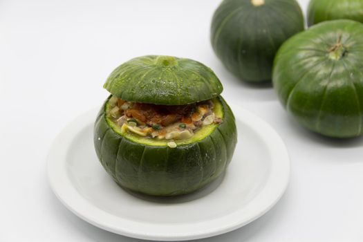 zucchini stuffed with meat and a variety of sauces