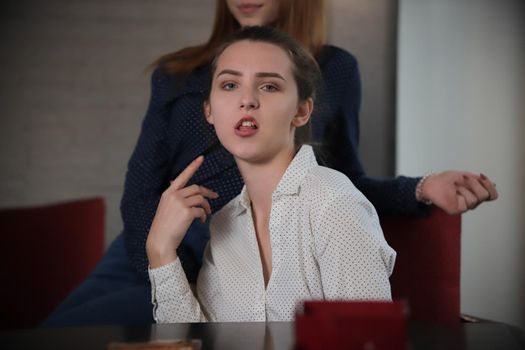 Portrait of young woman with funny face. Close up