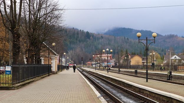 Ukraine, Yaremcha - November 20, 2019: the railway station of the village of Yaremche in the Carpathians. Old train station on an early cloudy morning. beautiful scenery in the mountains