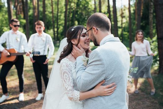 Wedding photography kiss bride and groom in different locations.