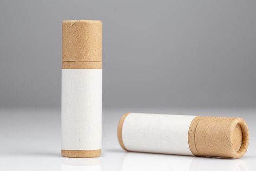 Zero Waste Lipstick packaging. Lip balm tube made of paper. Blank label mock up. Copy space for text