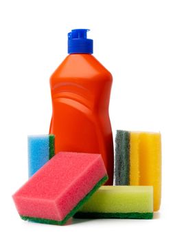 Bottles with cleaning products and sponge on a white isolated background, copy space