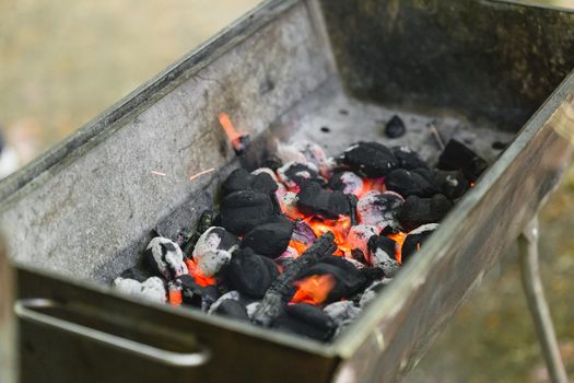 Hot burning charcoal, preparing barbeque grill for cooking