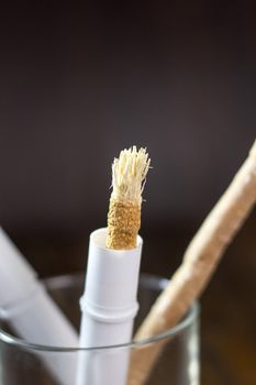 Miswak or siwak in a glass. Great photo for your needs.