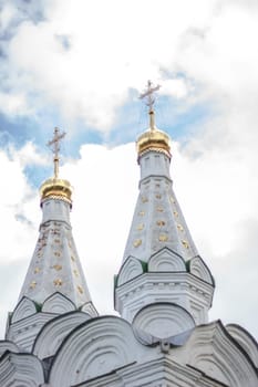 Domes of orthodox church in a Russia against blue sky