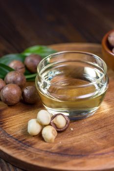 Macadamia nuts neat the can with macadamia oil. Great photo for your needs.