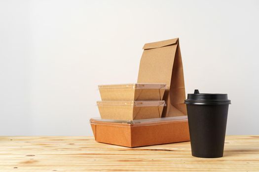 Paper bags with take away food and coffee cups containers. Lunch box