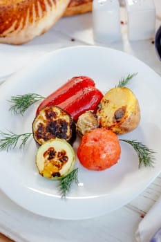 Grilled vegetables on white plate, great image for your needs.
