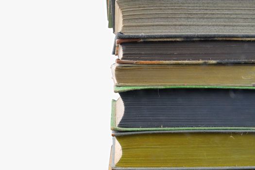 Stack of hardcover vintage books isolated with copy space. White background.