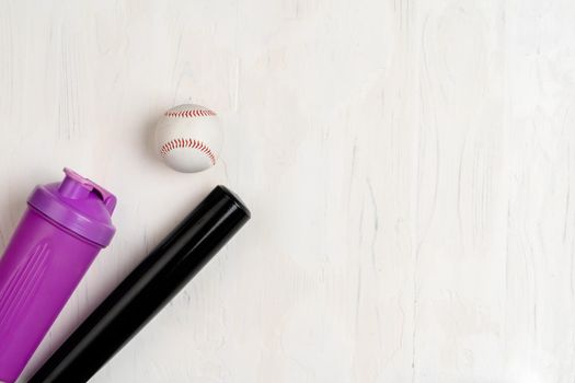 Baseball bat and ball, view from above. Close up.