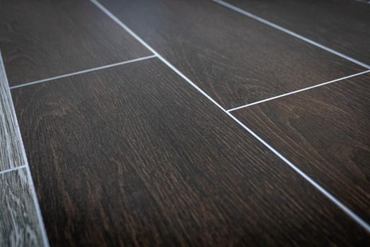 Ceramic tiles flooring - texture of natural ceramic floor decorating as wood.