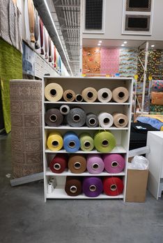 Big sewing rolls in a carpet mall.