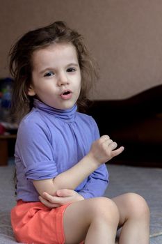 Little kid girl with pain in elbow