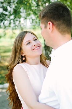 Young lovely couple at the nature park