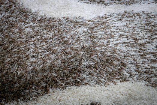 Close up view of carpet. Wall-to-wall carpeting background