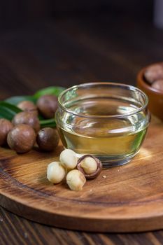 Macadamia nuts neat the can with macadamia oil. Great photo for your needs.