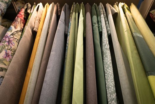 Fabric materials in a shop. Curtains at market