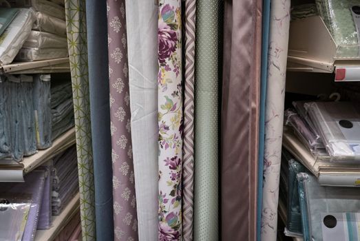 Fabric materials in a shop. Curtains at market