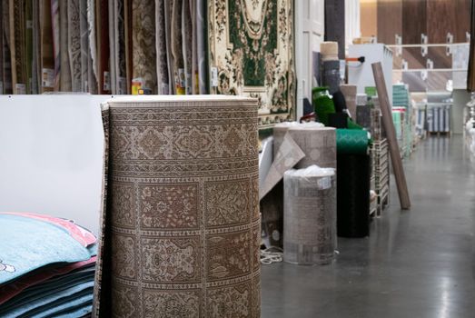 Big roll of carpet in a home decoration mall.