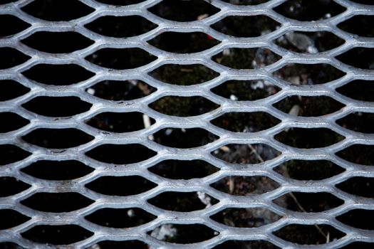 Mesh fence background.Grid iron grates, Grid pattern, steel wire mesh fence wall background, Chain Link Fence with White Background.