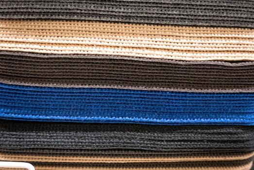 Pile of car mats in a fabric shop.