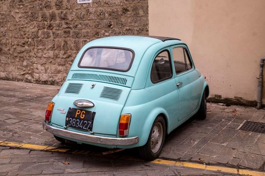 terni,italy november 05 2021:fiat 500 vintage car in light blue color