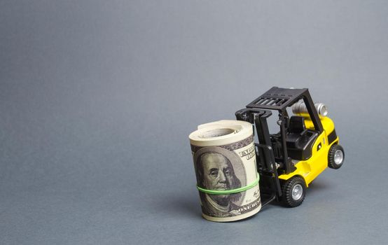 Yellow forklift truck can't lift a huge bundle of dollars. Expensive loans, high tax burden. attracting investment. High costs and barriers to business. Improving business processes and logistics