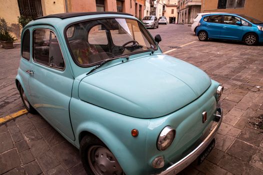 terni,italy november 05 2021:fiat 500 vintage car in light blue color