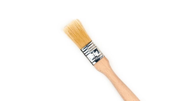 New paint brush on white background. Decorating tool.