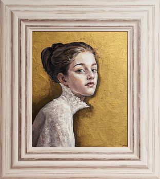 Framed oil painting. Portrait of a girl on a gold background. The art is done in a realistic manner.