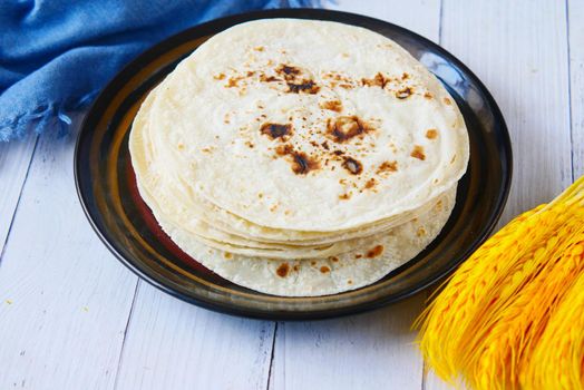 homemade roti chapati on table .,