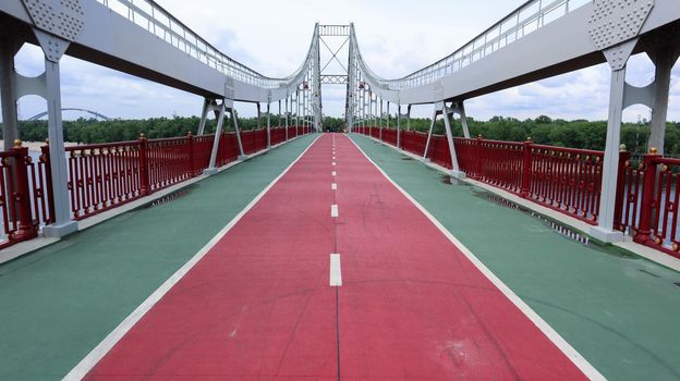 Park pedestrian bridge over the Dnieper River, which connects the central part of Kiev with the park area and the beaches of Trukhanovy Island. Without people
