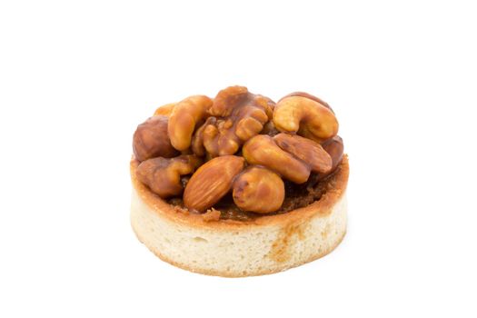 Tart with chocolate and nuts isolated on white background