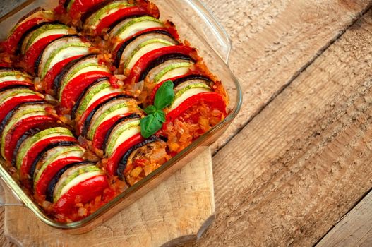 Ratatouille - Traditional Dish Of Provencal Cuisine. Healthy Vegetable Food. Wooden Background.