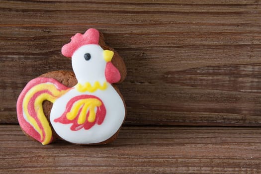 Christmas gingerbread on a brown wooden background