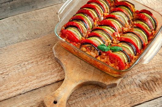 Ratatouille - Traditional Dish Of Provencal Cuisine. Healthy Vegetable Food. Wooden Background.