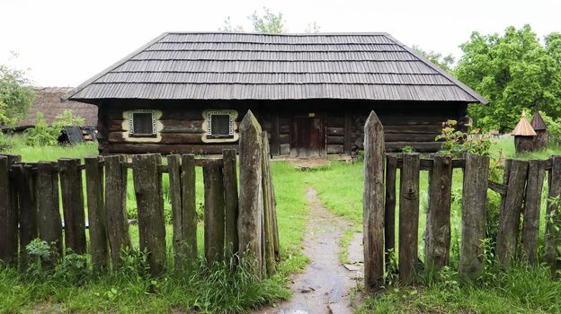 Ukraine, Kiev - June 11, 2020. The old house of peasants in the museum Pirogovo. National Museum of Folk Architecture and Everyday Life of Traditional Folklore Houses of Different Regions of Ukraine.