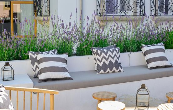 Sofa with cushions for relaxation on the terrace
