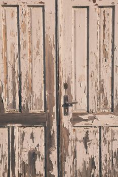 Old vintage wooden door with white paint