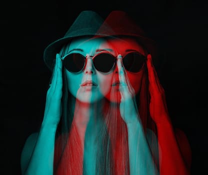 Beautiful stylish young woman in glasses and hat. Image with 3d, stereo anaglyph effect.