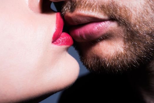 Lips kiss. Close-up of young romantic couple is kissing each other. Valentine day love beautiful